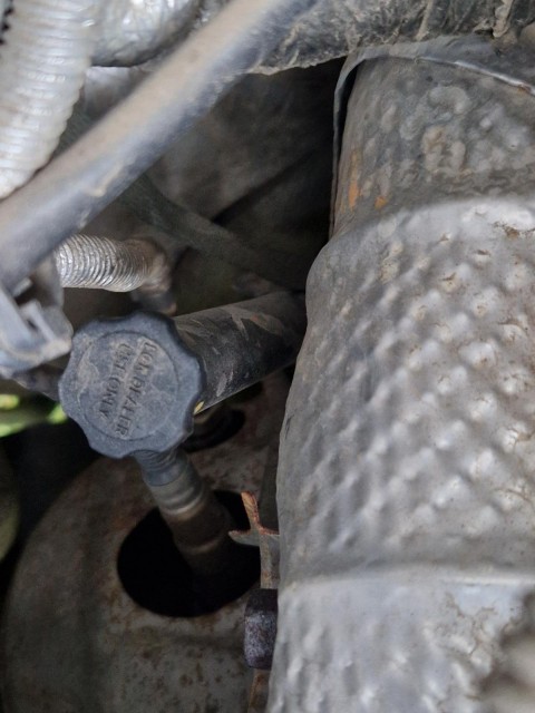 Circulaire avec une inscription pas claire.